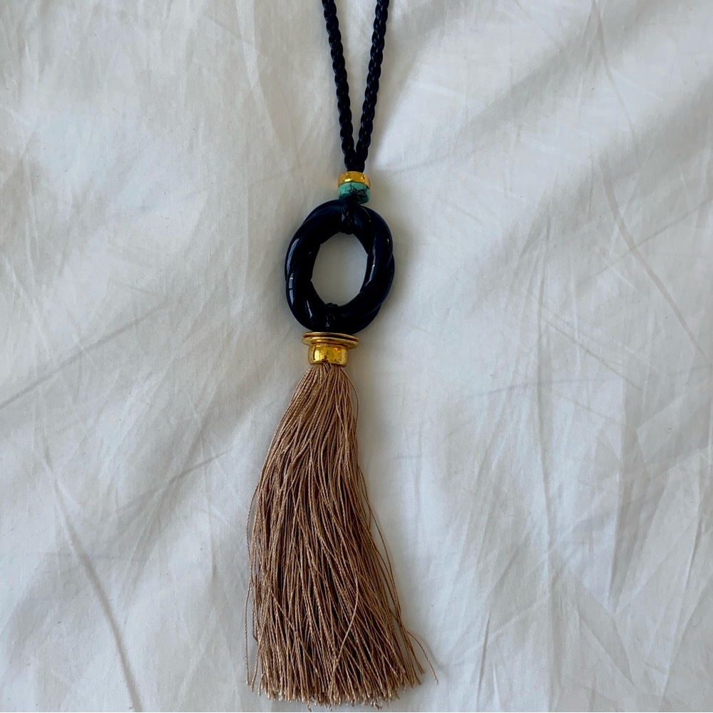 Braided leather & carved ebony tassel pendant